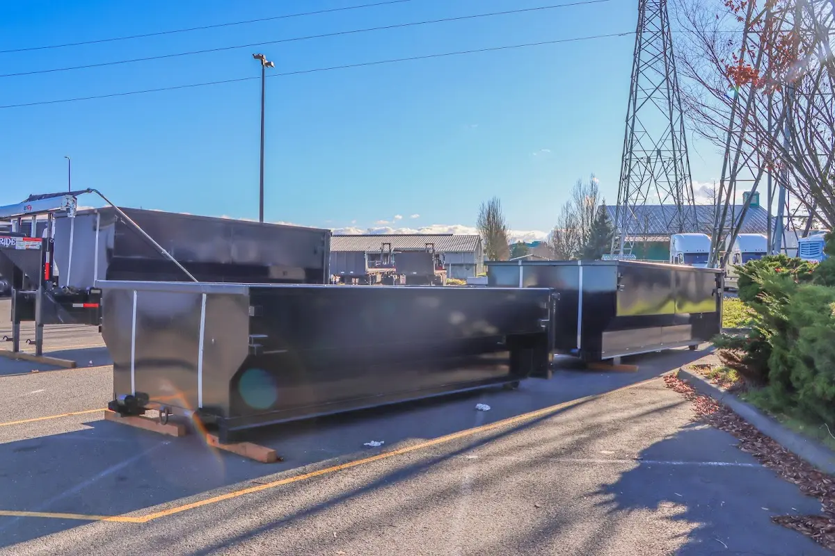Roll-off dumpster ready for waste disposal at job site for Concrete Dumpster Rental in Piedmont